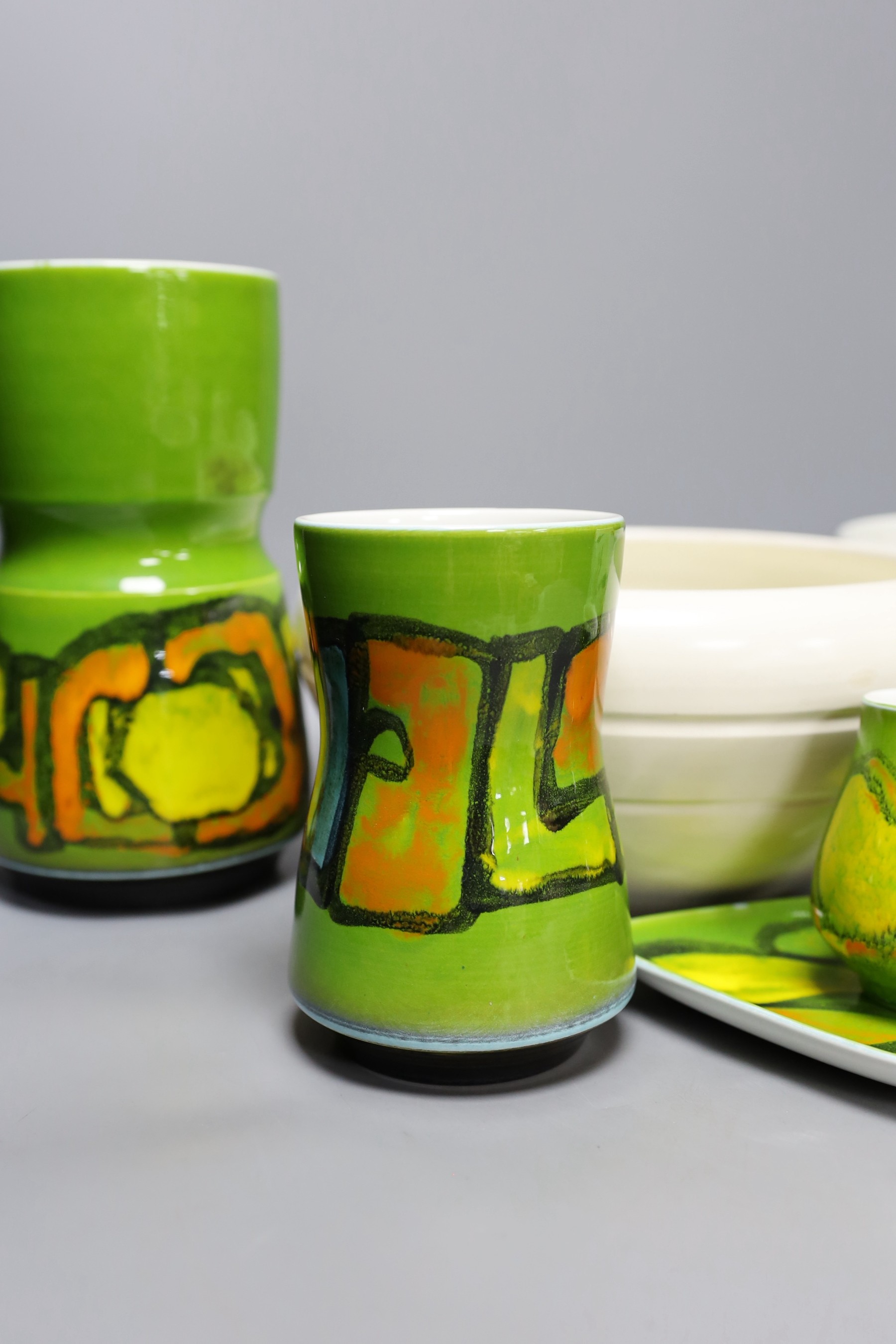 Four pieces of Delphis Poole Pottery, together with three other pieces of Poole, tallest 23cm (7)